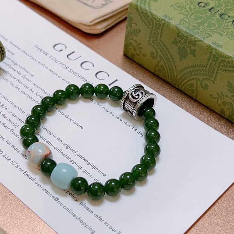 G*u*i bracelets